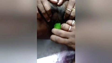 Indian babe with a sexy face sucking toy in the POV