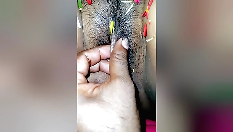 Indian woman and her partner share kitchen in flower bed