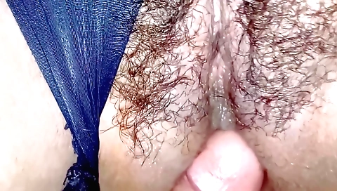 Hot brunette doing hairy masturbation in the bathroom
