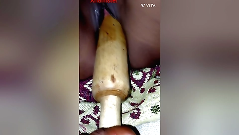 Indian girl in a sexy bra in bikini fucks with toy