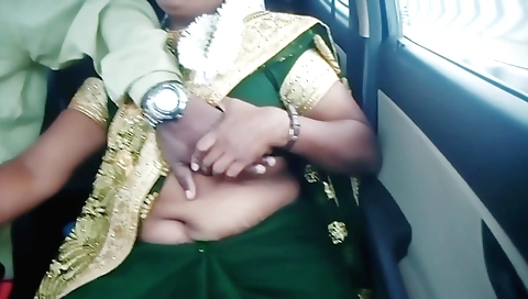 Indian chick with big tits is in the car taking cock
