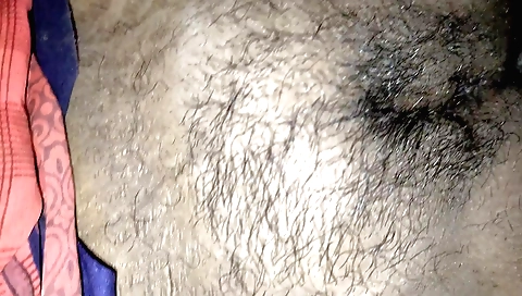 Hairy indian woman is shoving a black hole of pimpled skin out