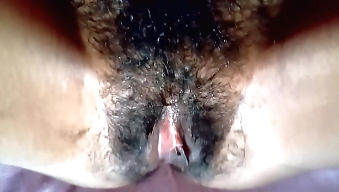 Indian girl is getting her pussy filled up by a toy