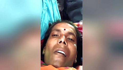 Indian brunette is showing her huge boobs in her bedroom