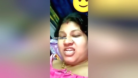 Indian brunette with big tits is being spanked on webcam