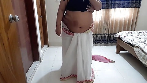 Big ass babe with a huge tummy takes off her sexy top