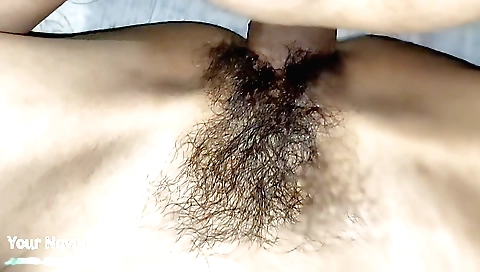 Indian milf with hairy pussy masturbates in bedroom