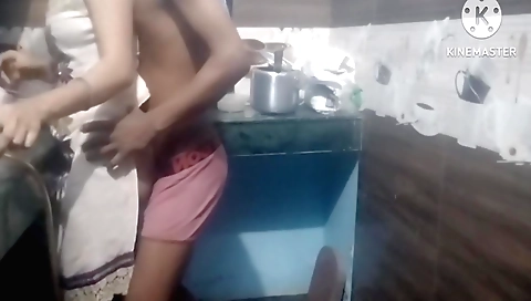 Indian teen fucks neighbor's stepdaughter in the kitchen