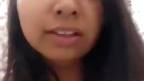 Indian brunette shows her big boobs during solo video