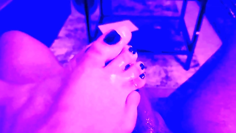 Petite blonde girl gets her feet pounded by a big dildo