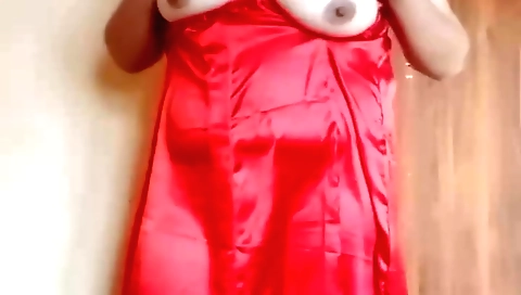 Busty brunette in an amateur webcam video masturbating