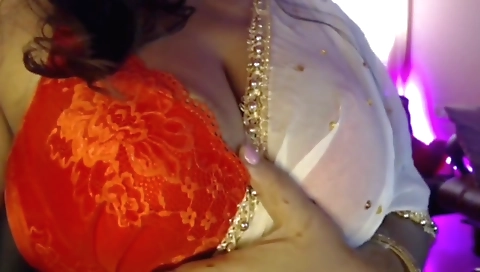 Sexy brunette girl with a big natural tits is playing