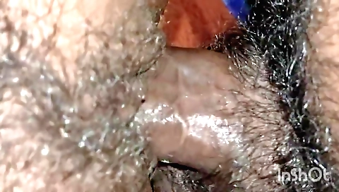 Indian girl takes photos on a camera and gets hairy