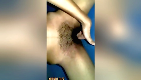 Hairy girl with a nice round booty in a white dress