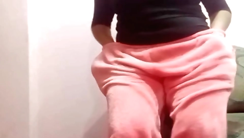 Naked brunette in a sexy solo video with her cunt exposed