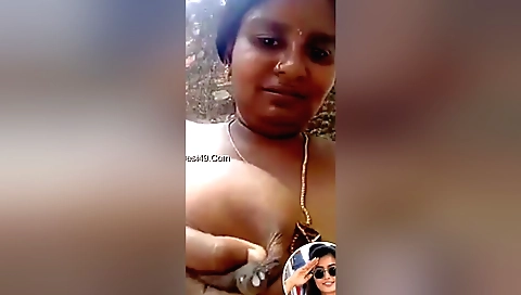 Indian bhabhi showing her big tits and body in the webcam