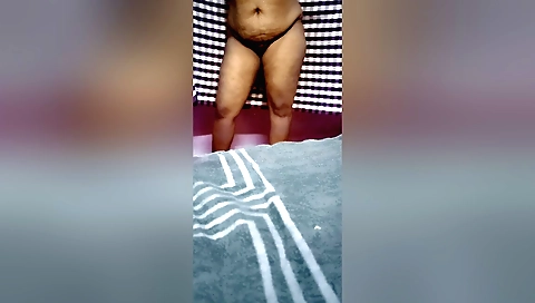 Amateur brunette with a sexy body shows off her juicy pussy