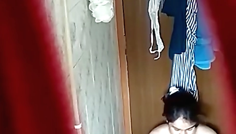 Stunning brunette relaxing in the shower in hidden cam video