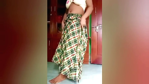 Indian girl plays around her feet and moves around