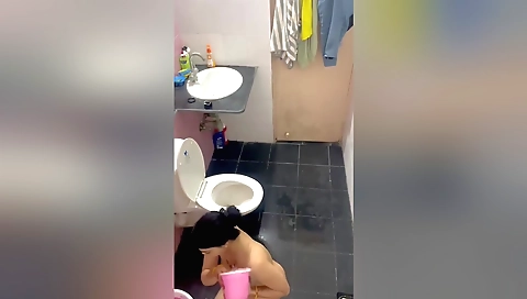Indian amateur brunette giving a bath in her own bathroom