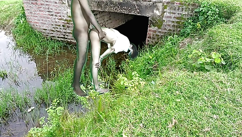 Indian girlfriend and her boyfriend have fun outdoors