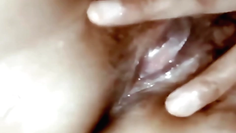 Busty hairy babe video showing her natural hairy pussy