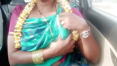 Indian babe with a big ass and a red dress in a hot car