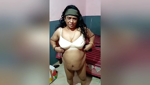 Hot brunette with huge boobs shows her juicy pussy