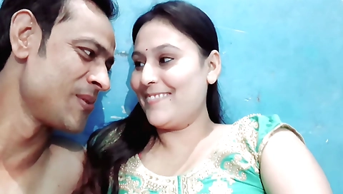 Indian brunette with big boobs is having fun with a dildo