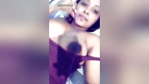 Hairy brunette amateur is showing her boobs on the camera